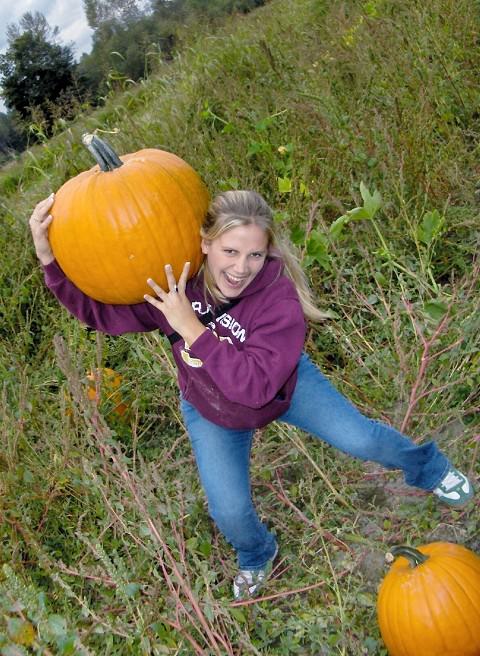 Alaina showing off her pumpkin carrying skills!