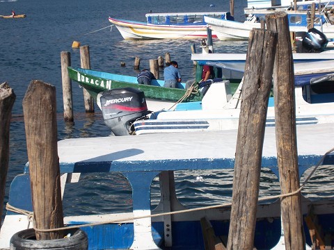 Could it be...?? Yes. As me and my team waited for a connector boat from San Pedro to Pana Jachel, Jimmy spotted the infamous boat. This is the 'Huracan'... the boat that ran me over the day before. I was under this boat. Wild. 