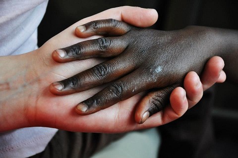 holding the hand of God