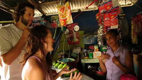 Deciding on a food purchase at the market across the street. 