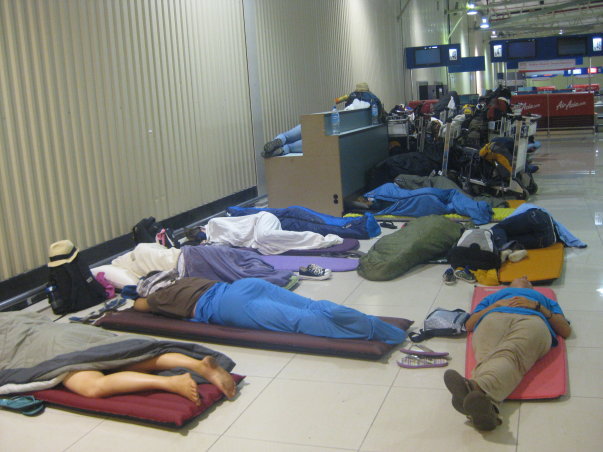 sleeping a few precious moments at the airport in Malaysia