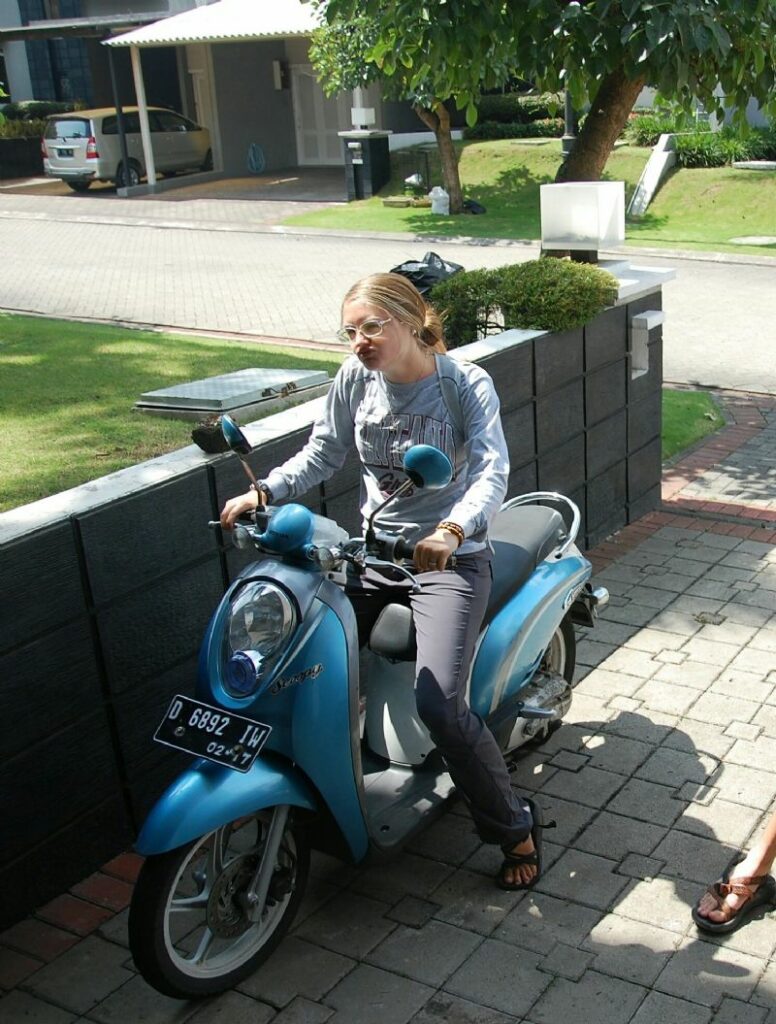 Me looking how I feel (so cool) on one of the two motorbikes people loaned us.