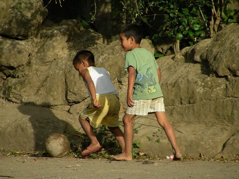 kids playing soccer in the barrios