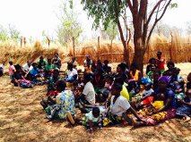 Mothers with their babies waiting for vaccines