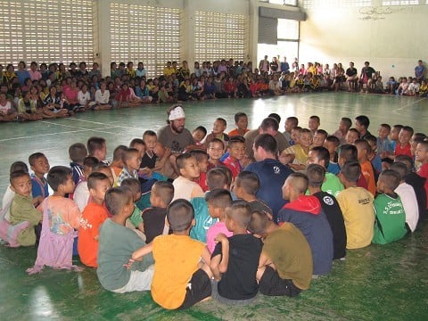 playing peel the onion with the kids at a school