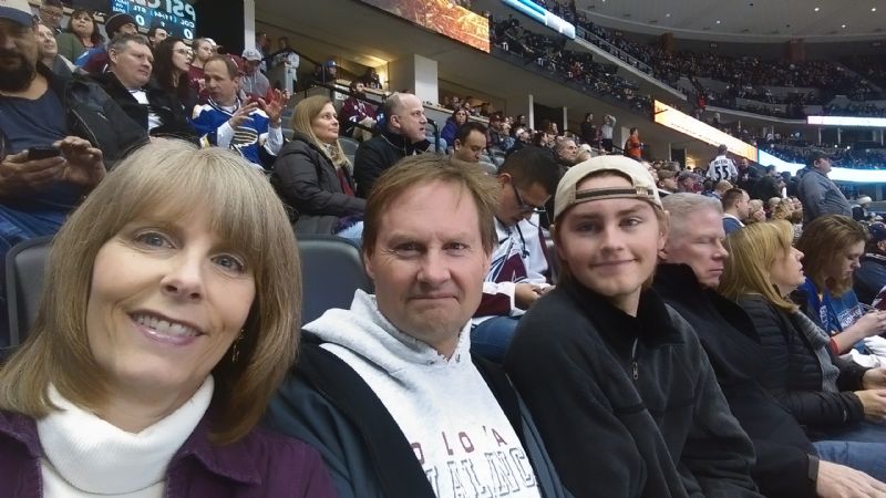 My mom, dad and brother at a Colorado Avalanche game (Jenna was already back to college doing fun things like homework and studying)!