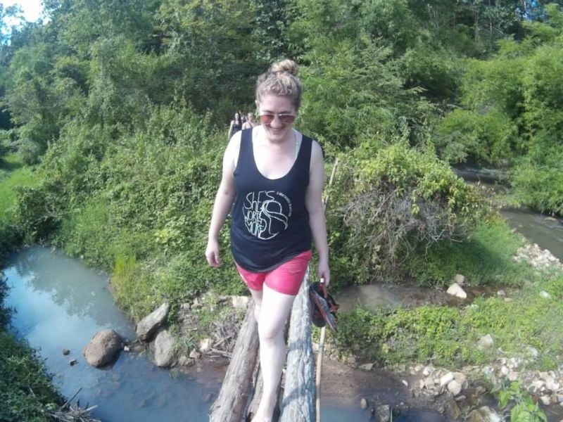 hiking barefoot through the jungle