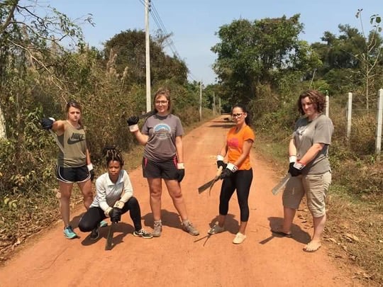 Clearing brush in Laos