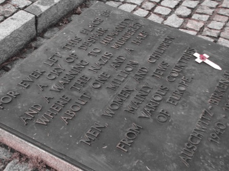 memorial at the site of the gas chambers - a stone with this message is written in every language of those who died there