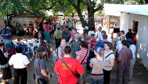 World Racers mingle with locals and wait for a church service to begin in Arroyo Palenque on Jan 7.