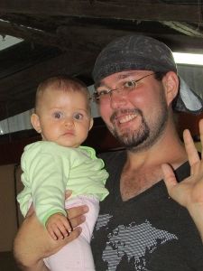 Luke practicing his baby holding skills