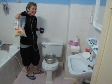 Steph cooking in our hotel bathroom