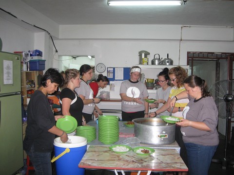 Dishing up the lunch we helped to prepare at the Kawan Center for the homeless in Penang, Malaysia