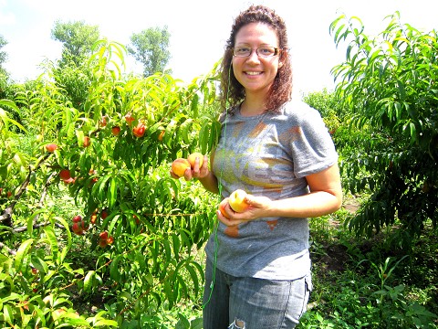 Christina picking peaches!