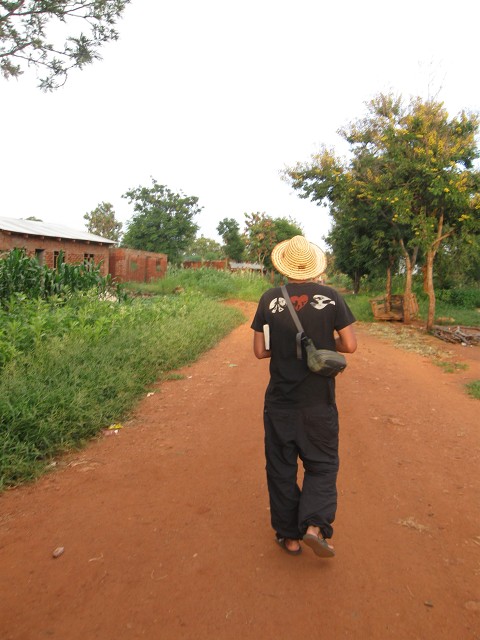 Micheal walking in the village, Tanzania