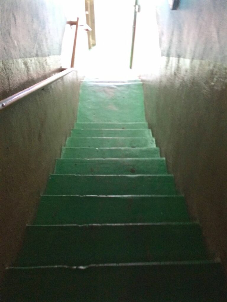 The metal stairs that led up to the school