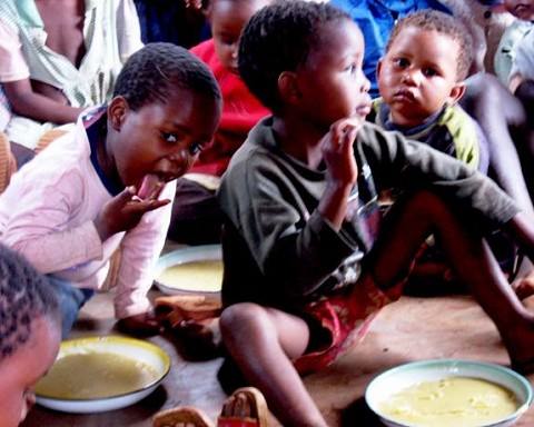 Lunch at Mbutu, notice the ripped dress in the back left corner.