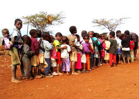 Kids lined up for hand washing at Mbutu