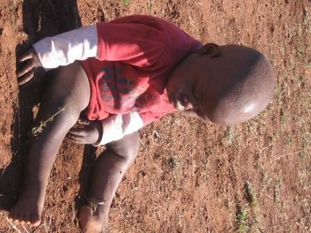Little orphan sleepin in the field sitting up. This one Broke my Heart!