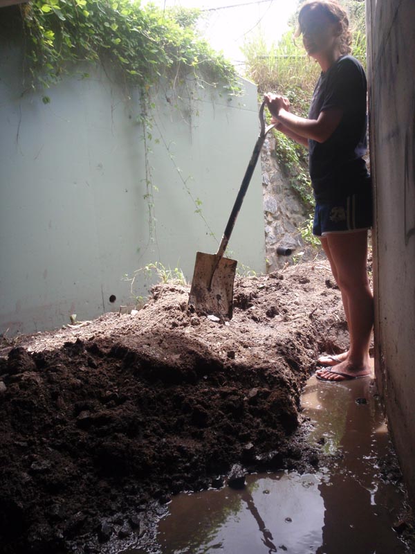 Simone preparing to dig out all that dirt. okay we helped too