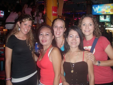 our team at one of the bars with 2 sisters we have become friends with