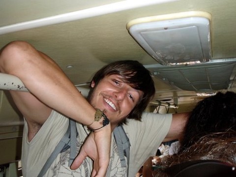 6'5 Bruce on a typical bus ride.