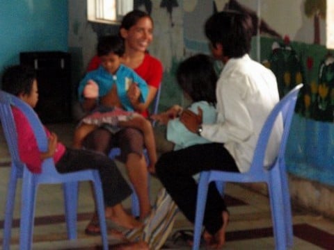 Lindsay talking w/our teacher.  He shared his testimony w/her after I left to the other parts of the facility.  