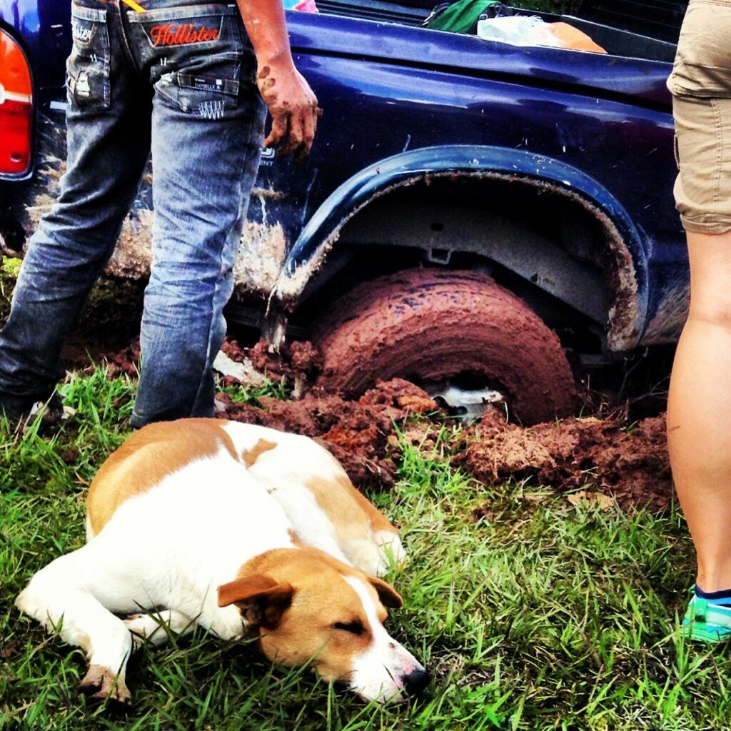 Jack doesn't seem to care that Pastor Arnoldo's truck is stuck in the mud.