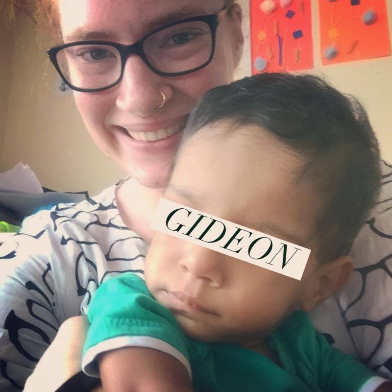 Sarah with a little boy from the home in India