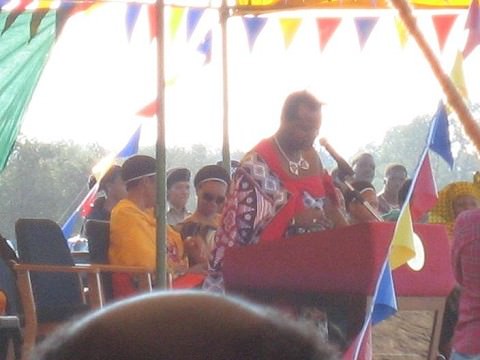 The King of Swaziland with his wives behind him