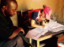 Medical Mission ~ tallying medical records for baby vaccines in the bush of Zambia