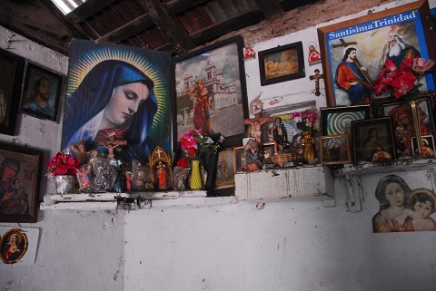 saints and mary are idolized here...madre´s living room.