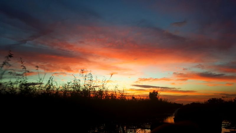 The sunset as we were riding a boat from a village that we preach the gospel in. This is beautiful, but we as humans are still his greatest creation!
