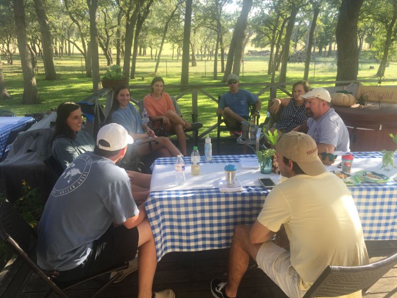 Some of my family sitting out on the deck.