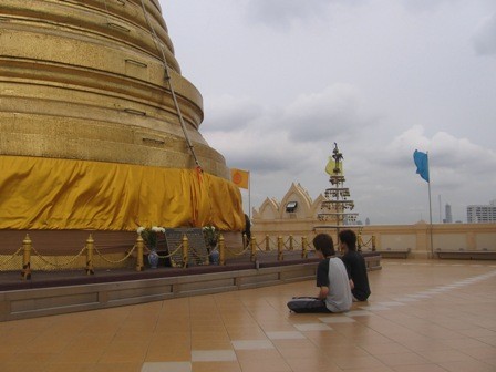 Thailand - Men meditating at temple