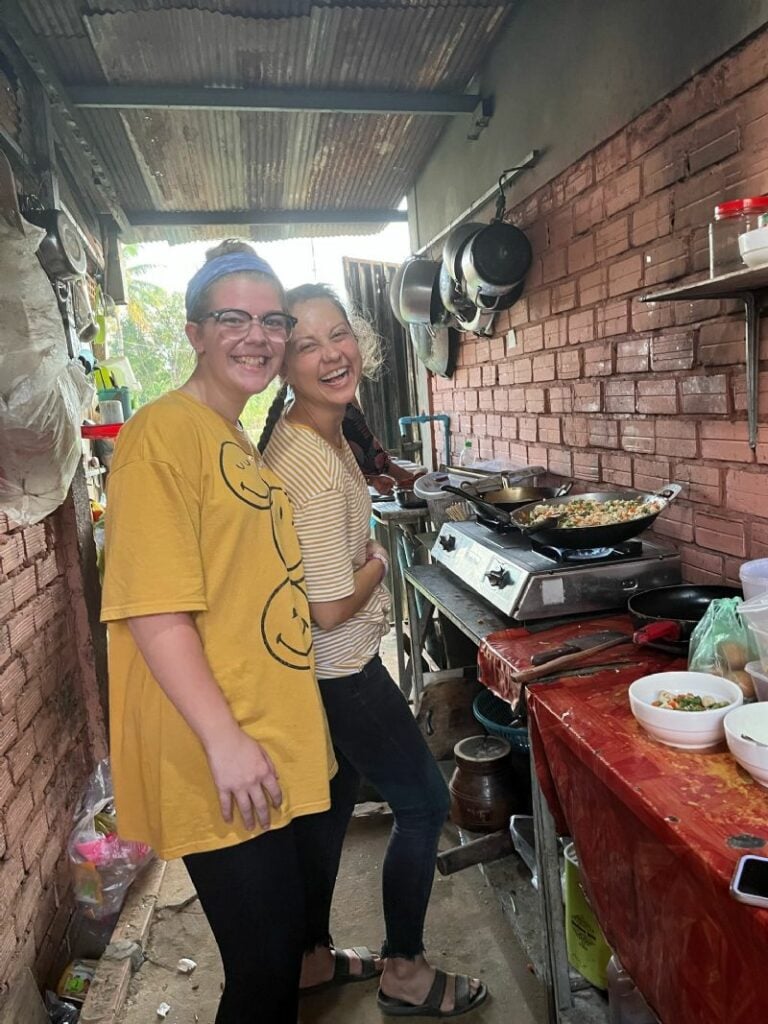 Sydney and I cooking dinner for the team after going to the local market!